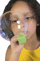 girl blowing bubbles