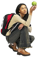 teen with apple