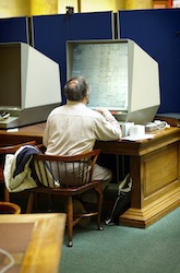 bald man in library